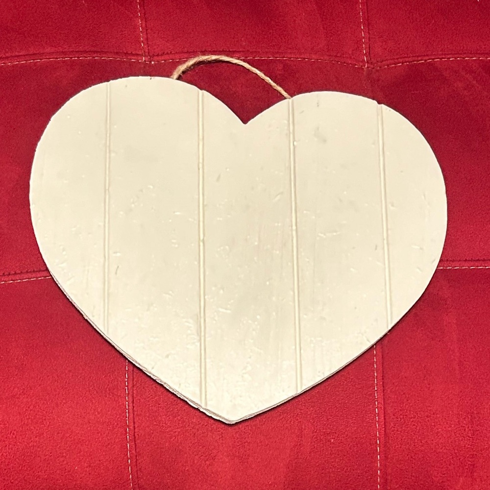 White wooden hanging heart, with rope hanger.